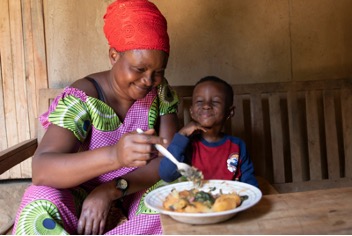 Gloriose feeding her son